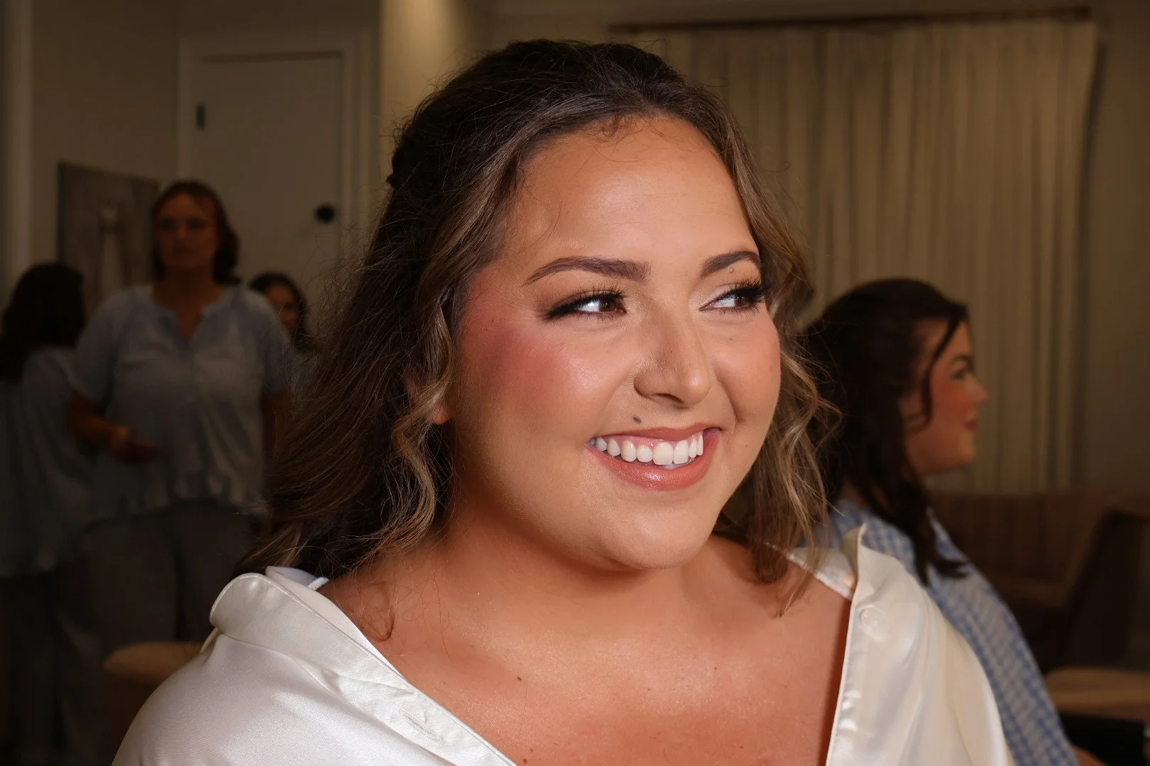 Luxury bridal makeup and soft glam hairstyle by Golden Girls Glam with glowing skin and loose waves