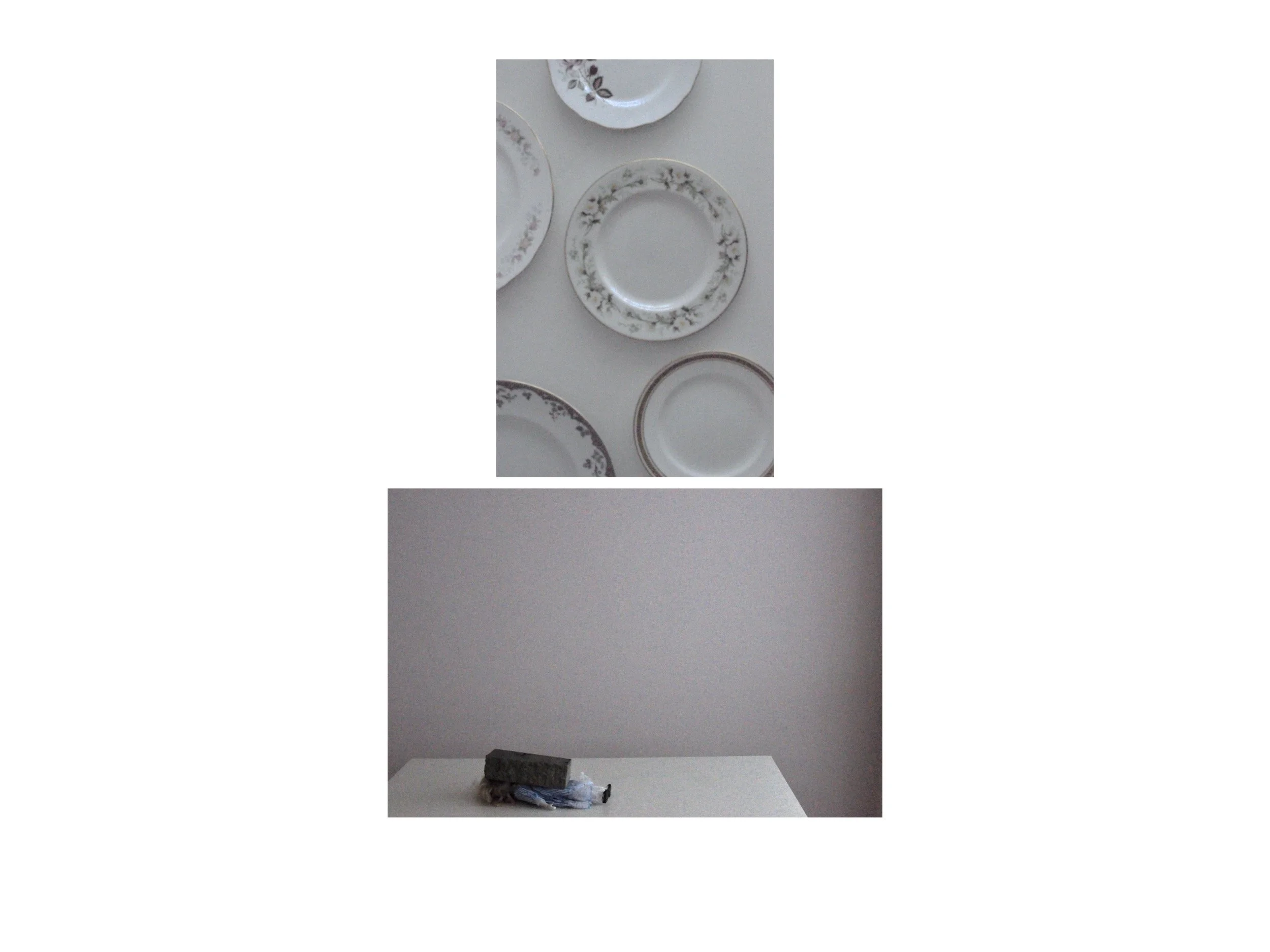 Vertical diptych creating a disturbing contrast. Top: an arrangement of clean dinner plates on a white surface. Bottom: a doll lies pinned under a heavy brick.
