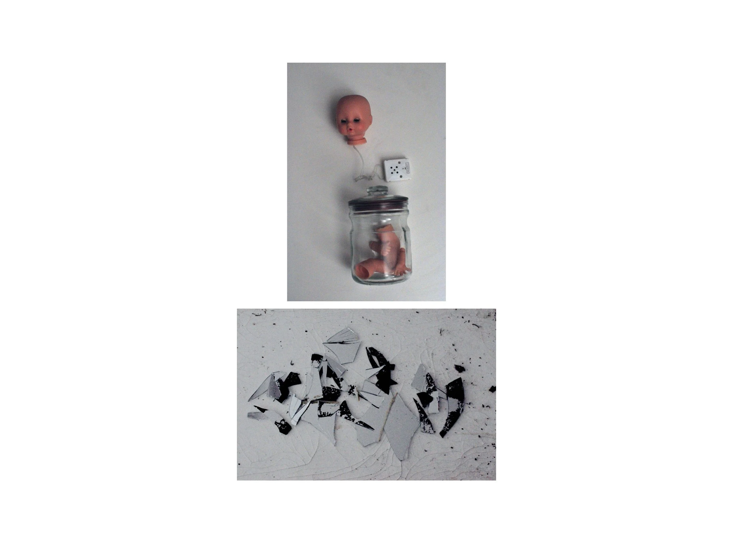  A vertical diptych. Top: a doll's head connected to an electrical plug, above a jar filled with doll hands and legs. Below this, scattered shards against a white background. 