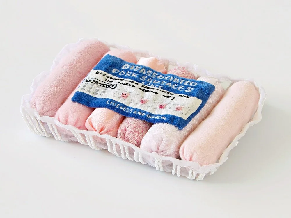 Disassociated pork sausages