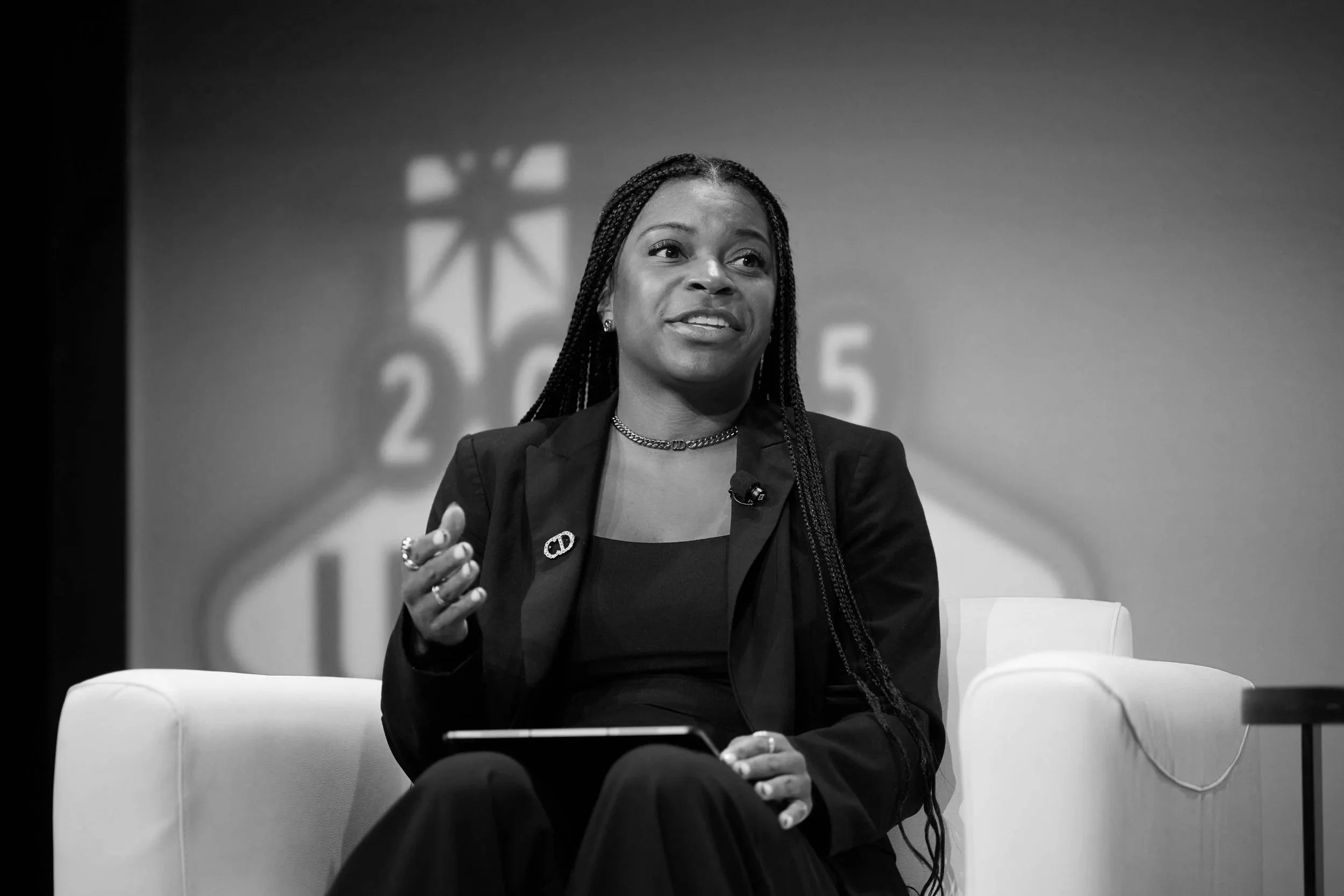 Courtney Davis moderating a keynote panel.