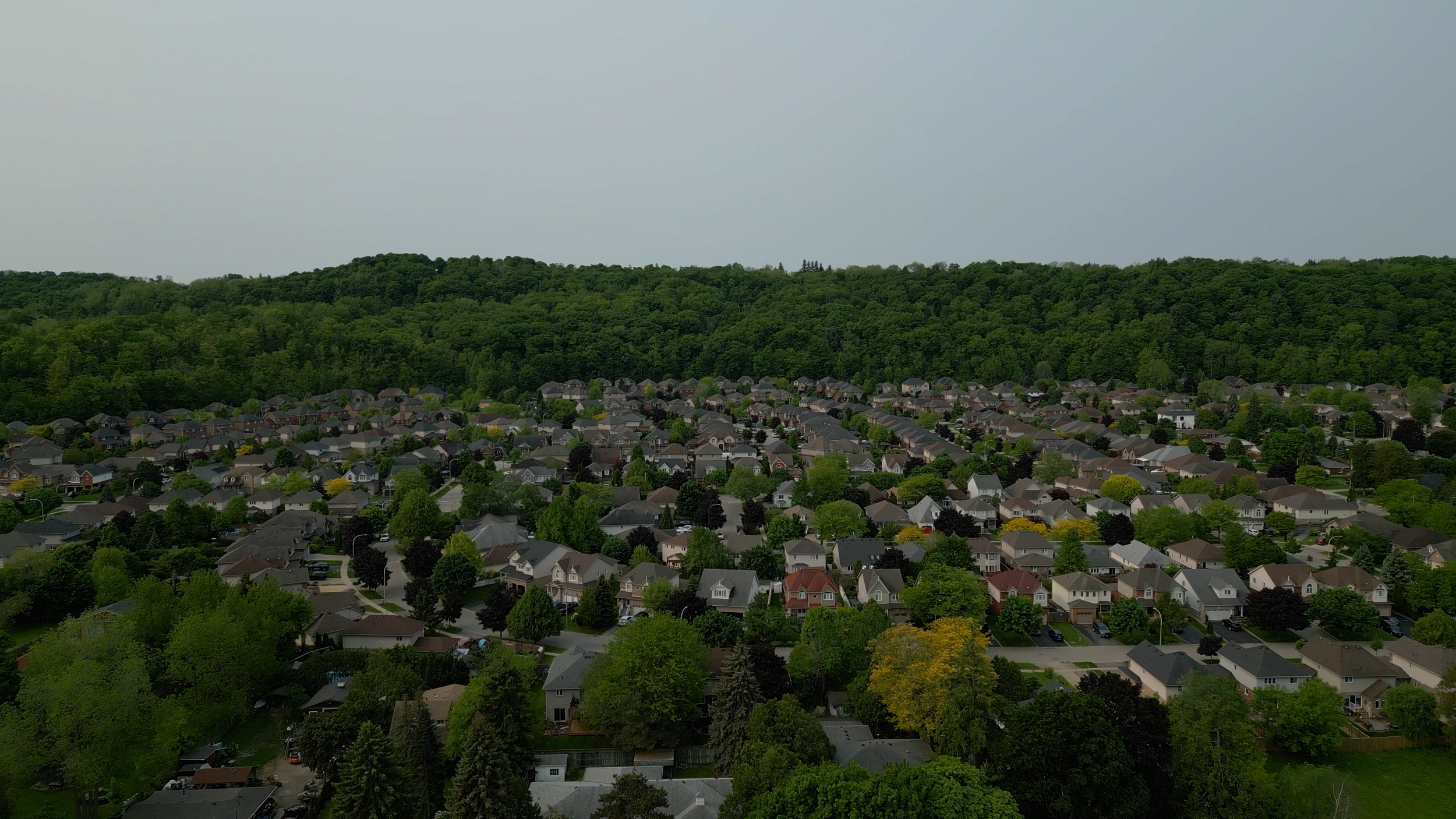 4K AERIAL PARK SCHOOL TOWN FLY OVER.00_00_00_16.Still001.png