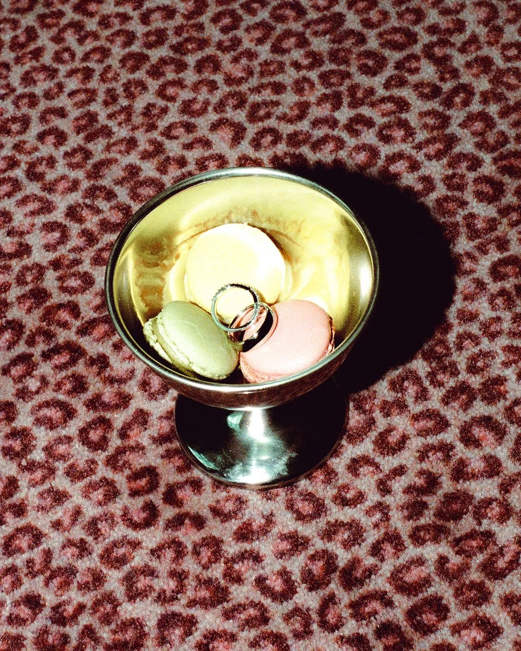 Editorial detail photography of wedding rings in a dish from a southern California wedding