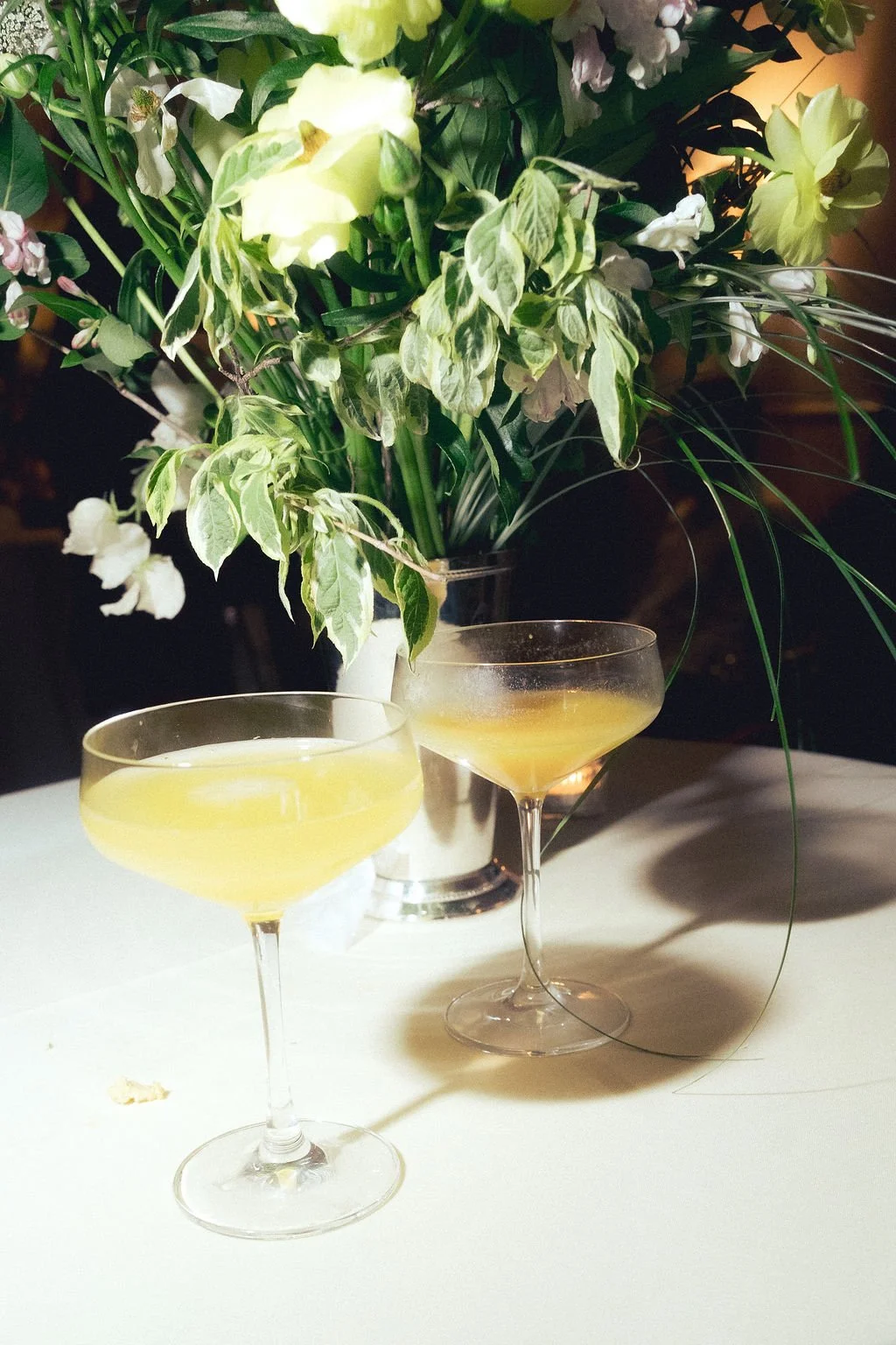 Documentary wedding photograph of two drinks sitting on a table at a southern California wedding reception