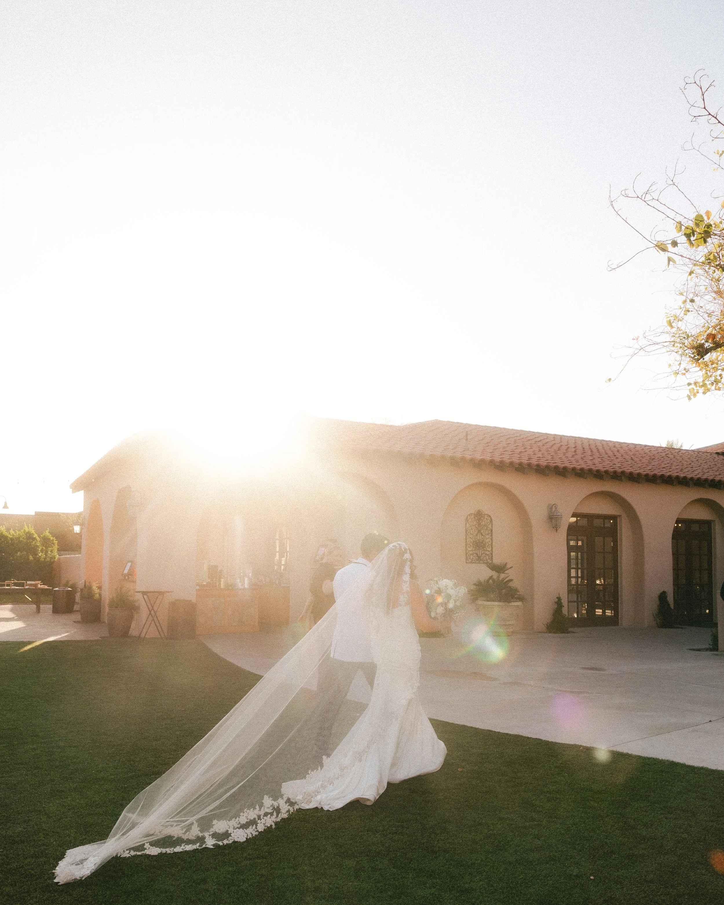 Documentary wedding photograph of a bride and groom exiting their southern California wedding ceremony