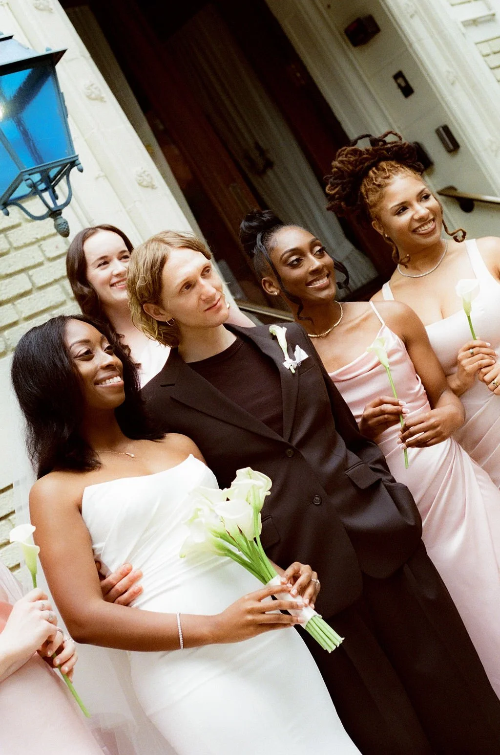 35mm film wedding photograph of a bride and groom with their bridesmaids at a southern California Wedding