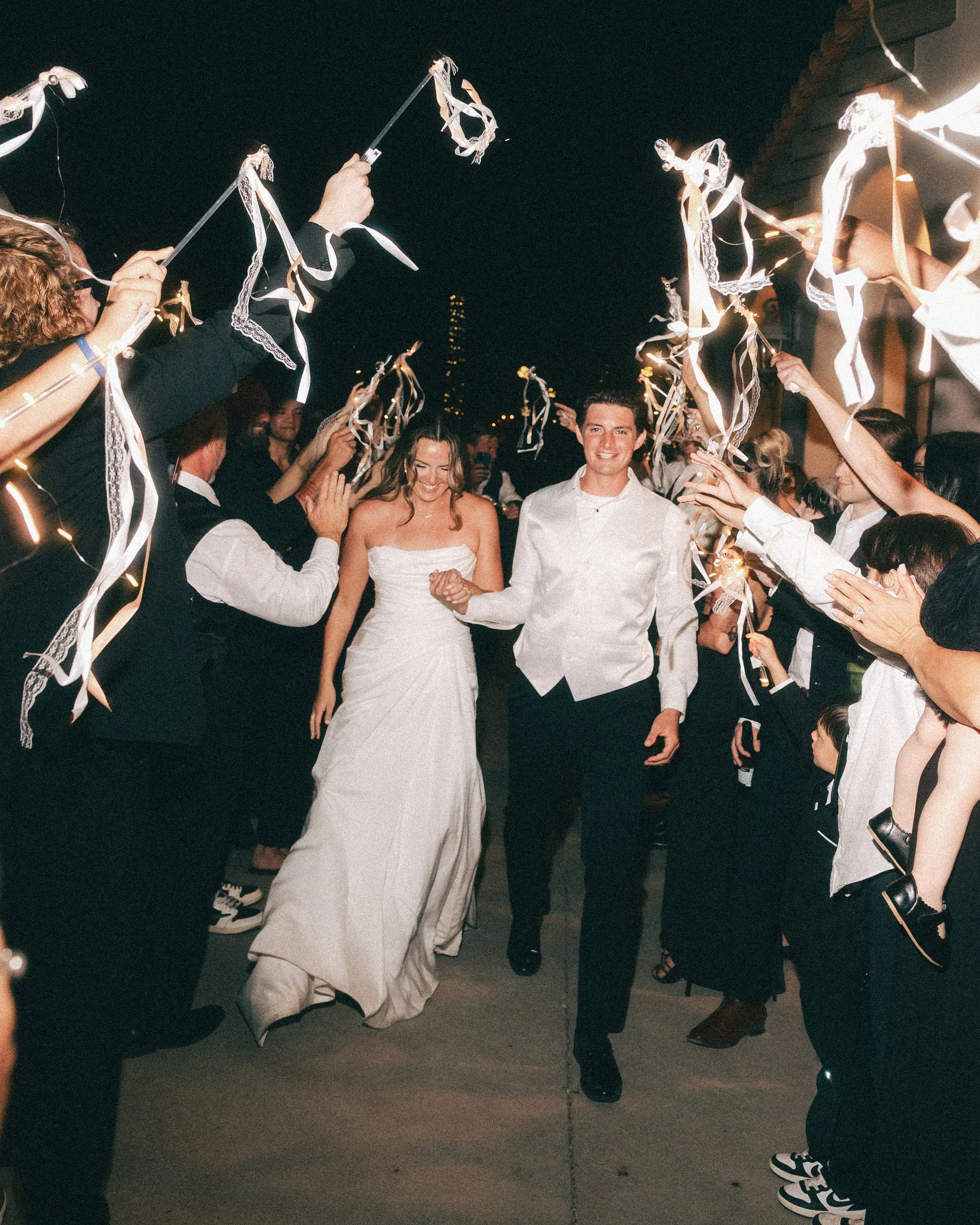 Editorial wedding photograph of a grand exit in southern California
