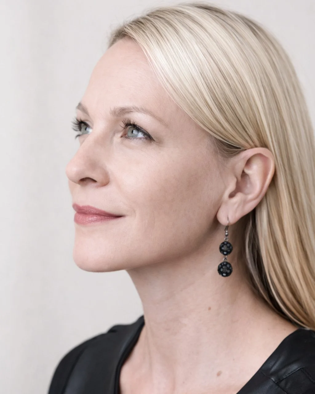 Close-up headshot of Caroline, interior designer and founder of Caroline By Design in Montclair NJ.