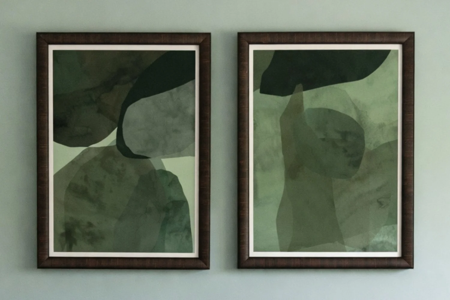 Abstract botanical artwork above upholstered bed in an organic coastal bedroom designed by Caroline by Design in Montclair, NJ.