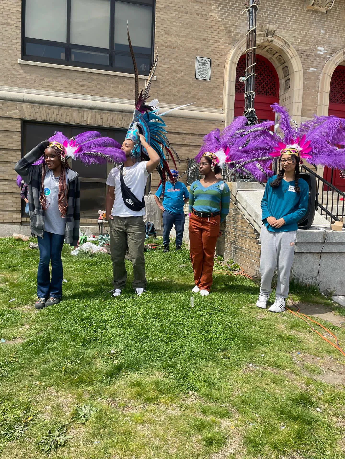 youth in traditional head dresses