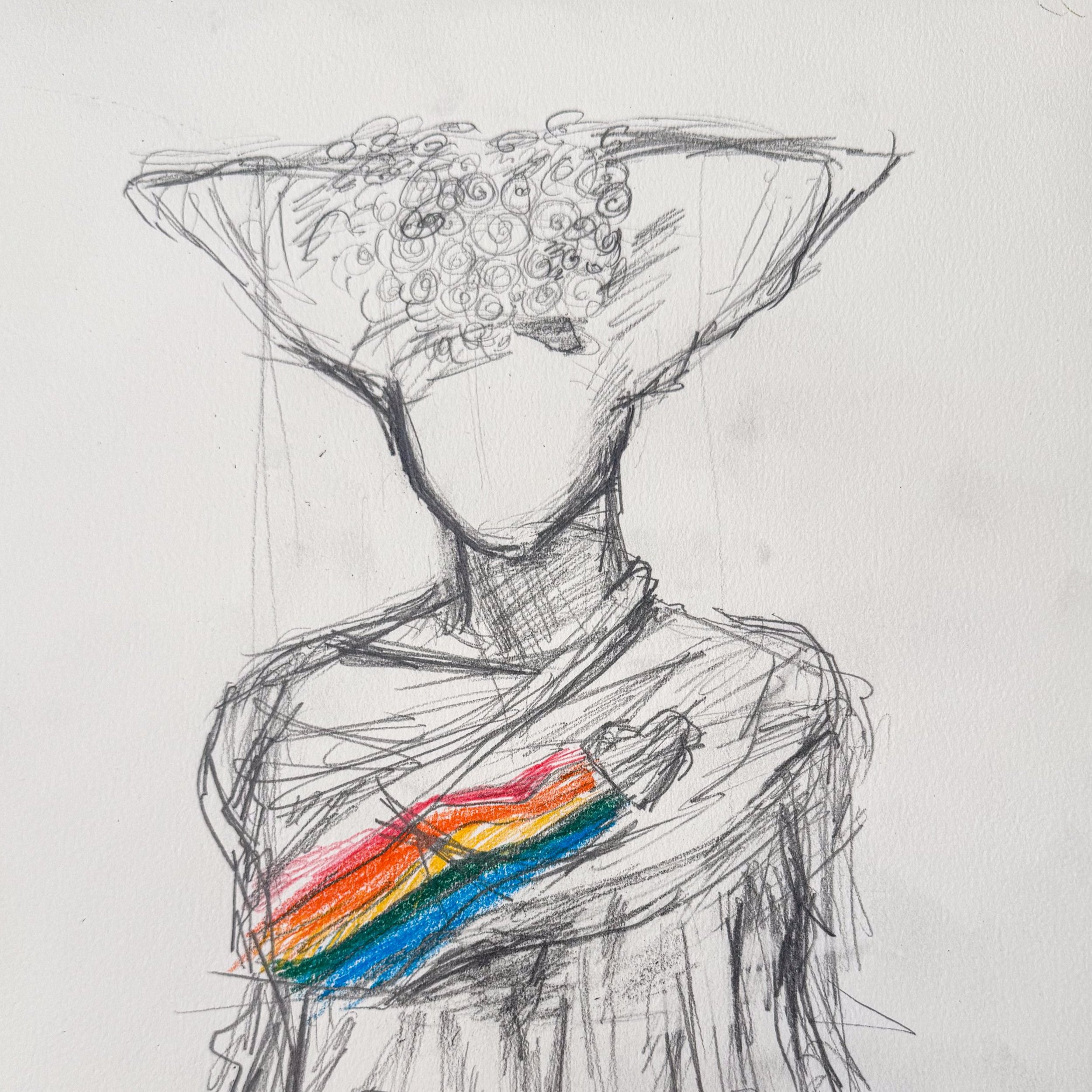 headshot of a man in a suit with glasses looking to the left