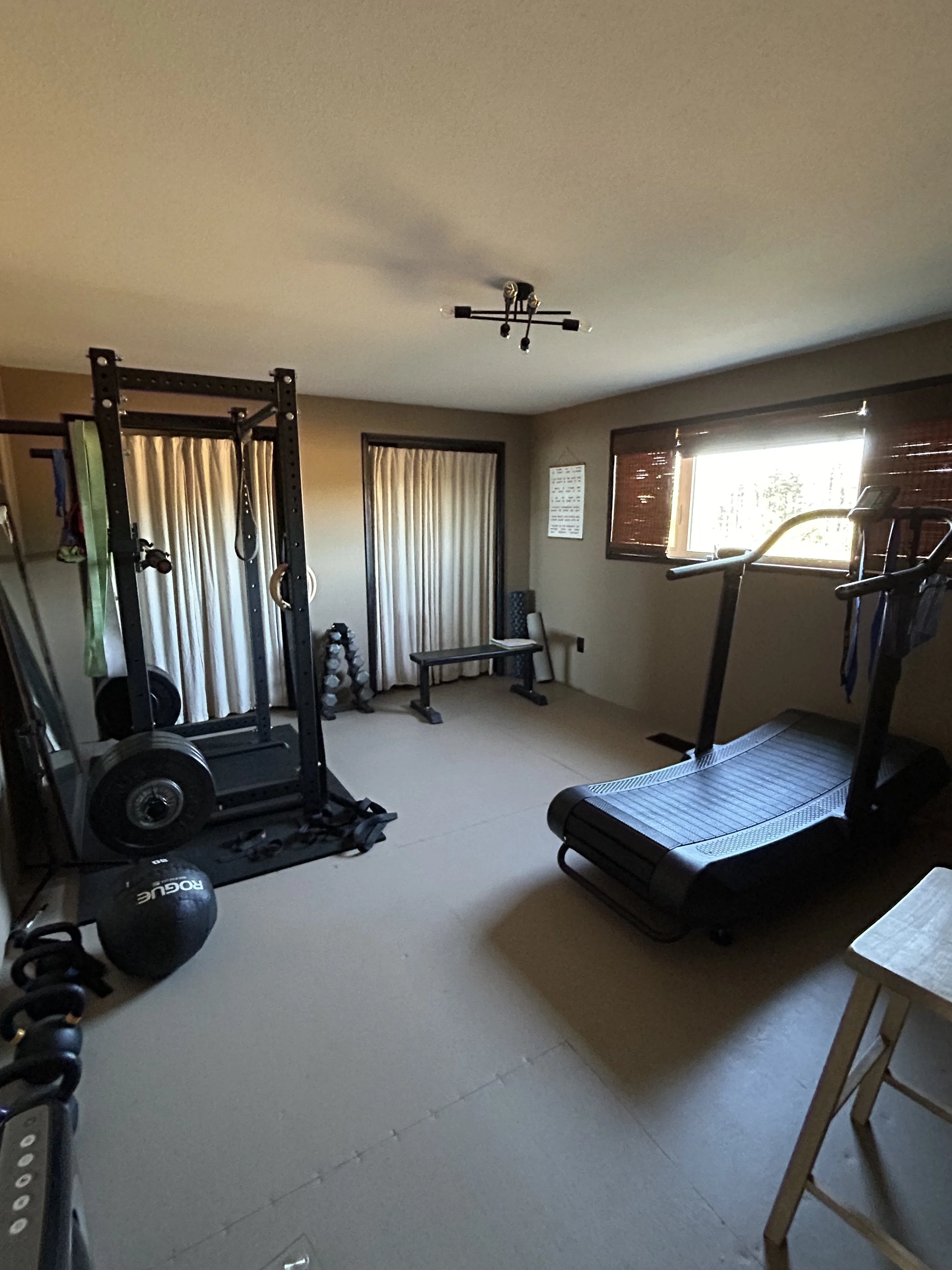 Home gym with freeweights, treadmill