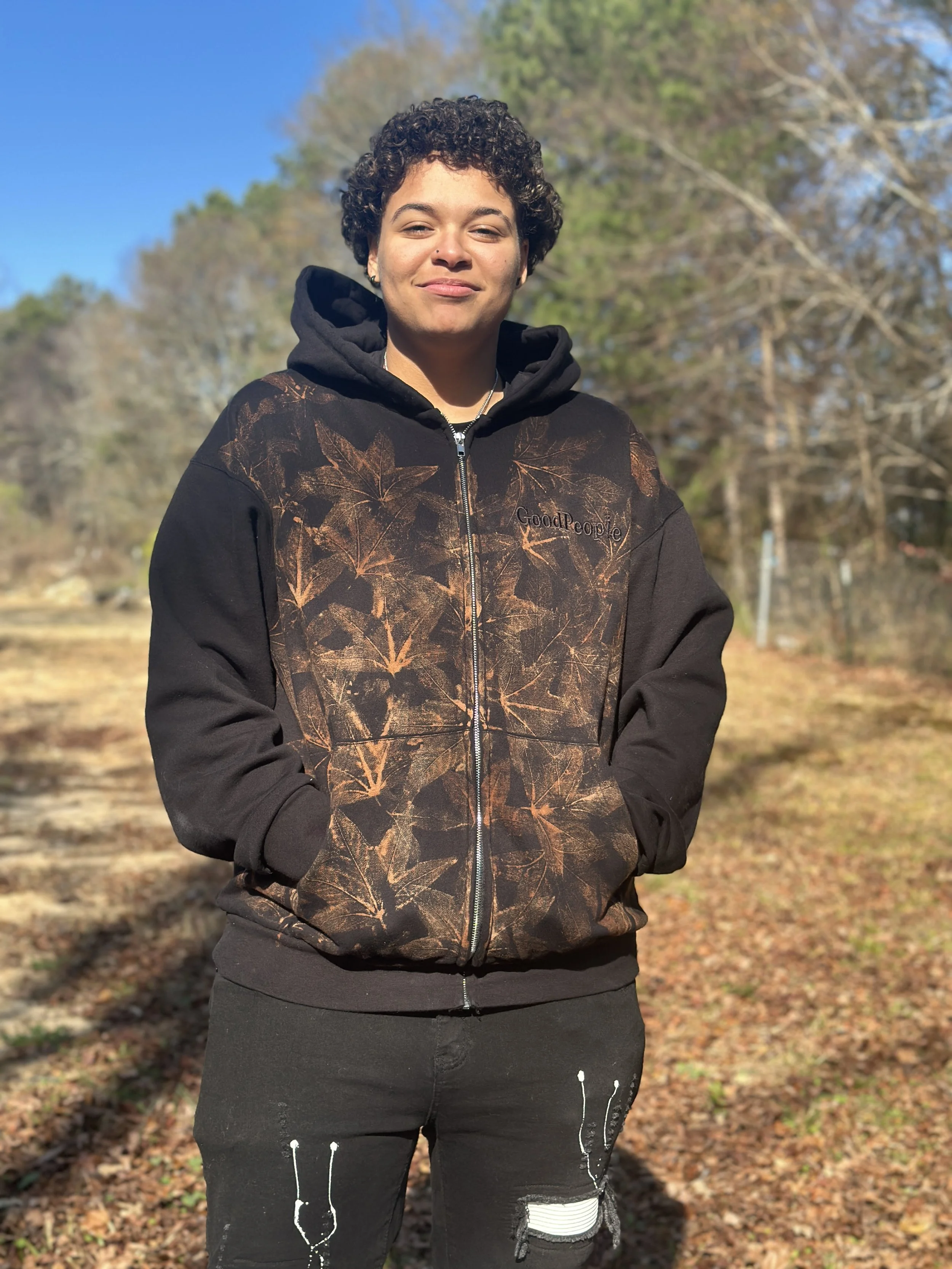 Client wearing hand-made leaf bleached Good People zip up outdoor photo