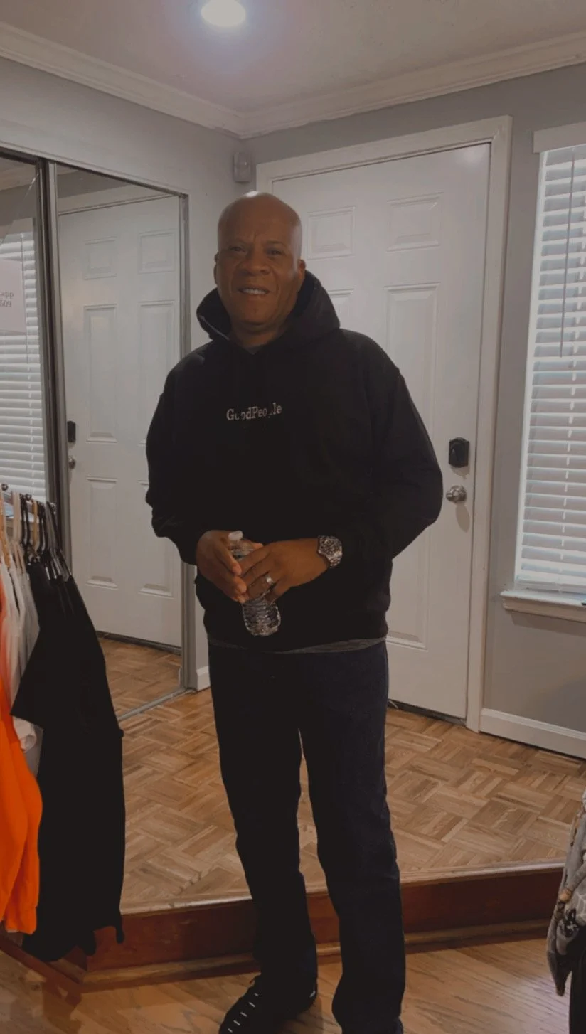 Family Member Wearing Black Embroidered Good People Hoodie