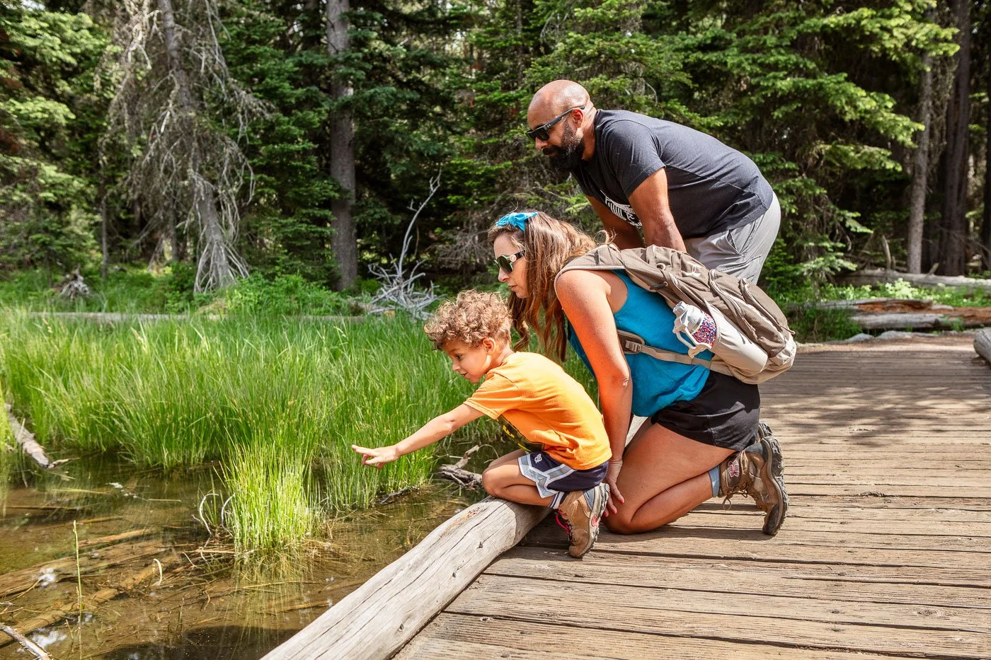 Lifestyle photography, including a day in the life of a family camping in an RV at Grand Teton National Park. Image created for Rev Group.
