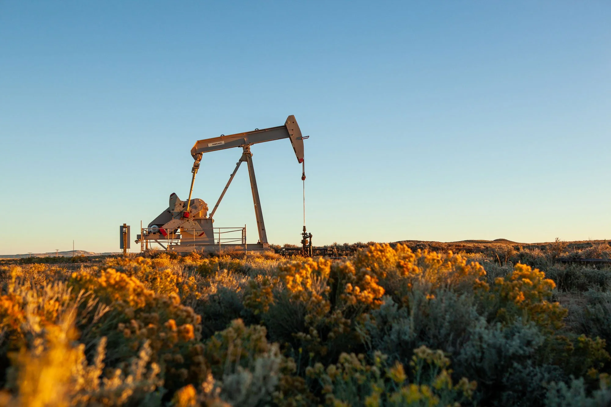 Pumpjack during sunrise near Riverton, Wyoming.