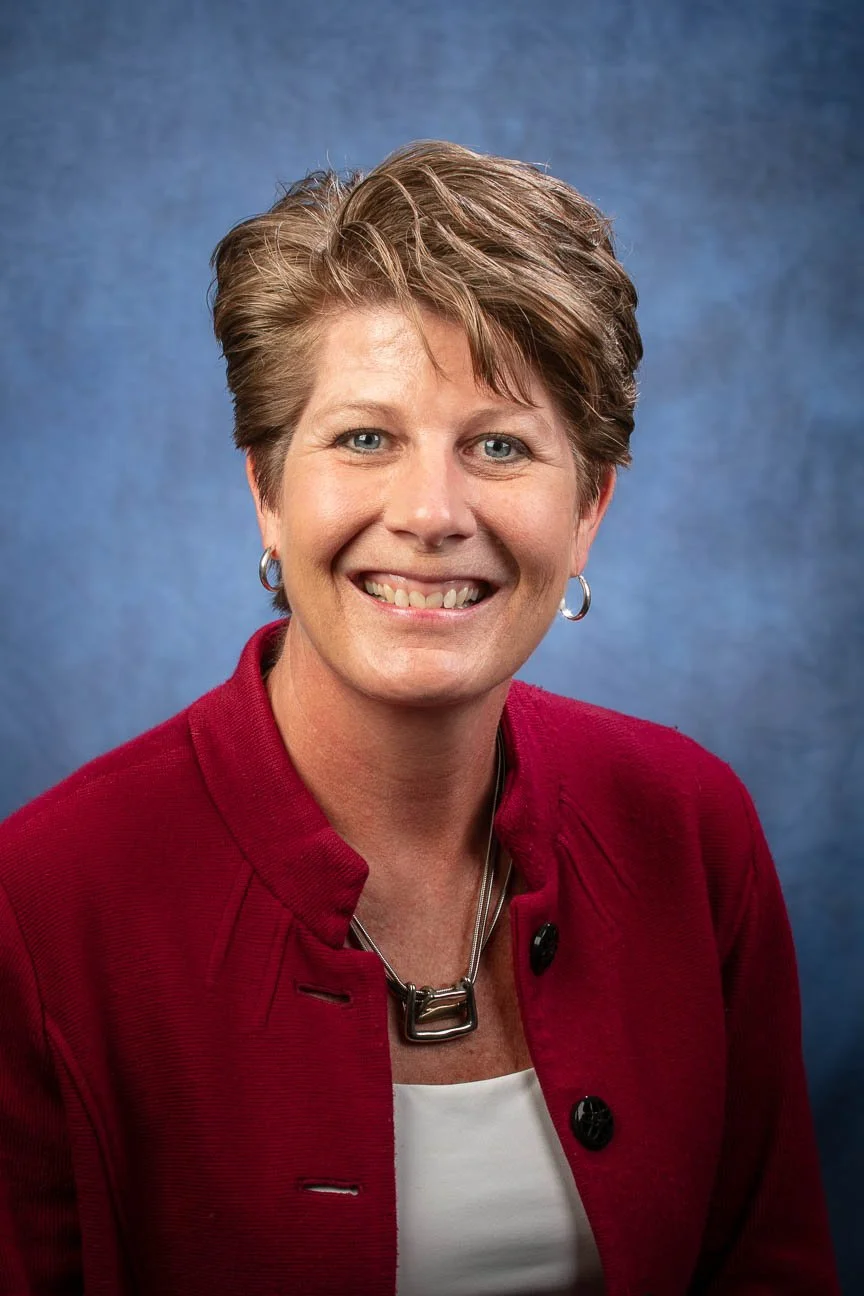 Executive director headshot portrait for branding and marketing use.
