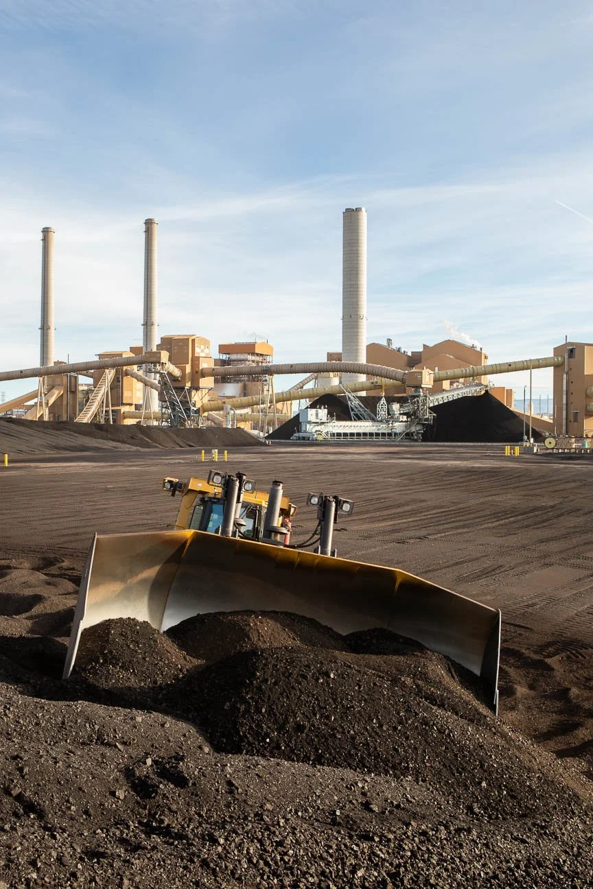 Bulldozer pushing coal at the Springerville Generating Station in Springerville, Arizona.