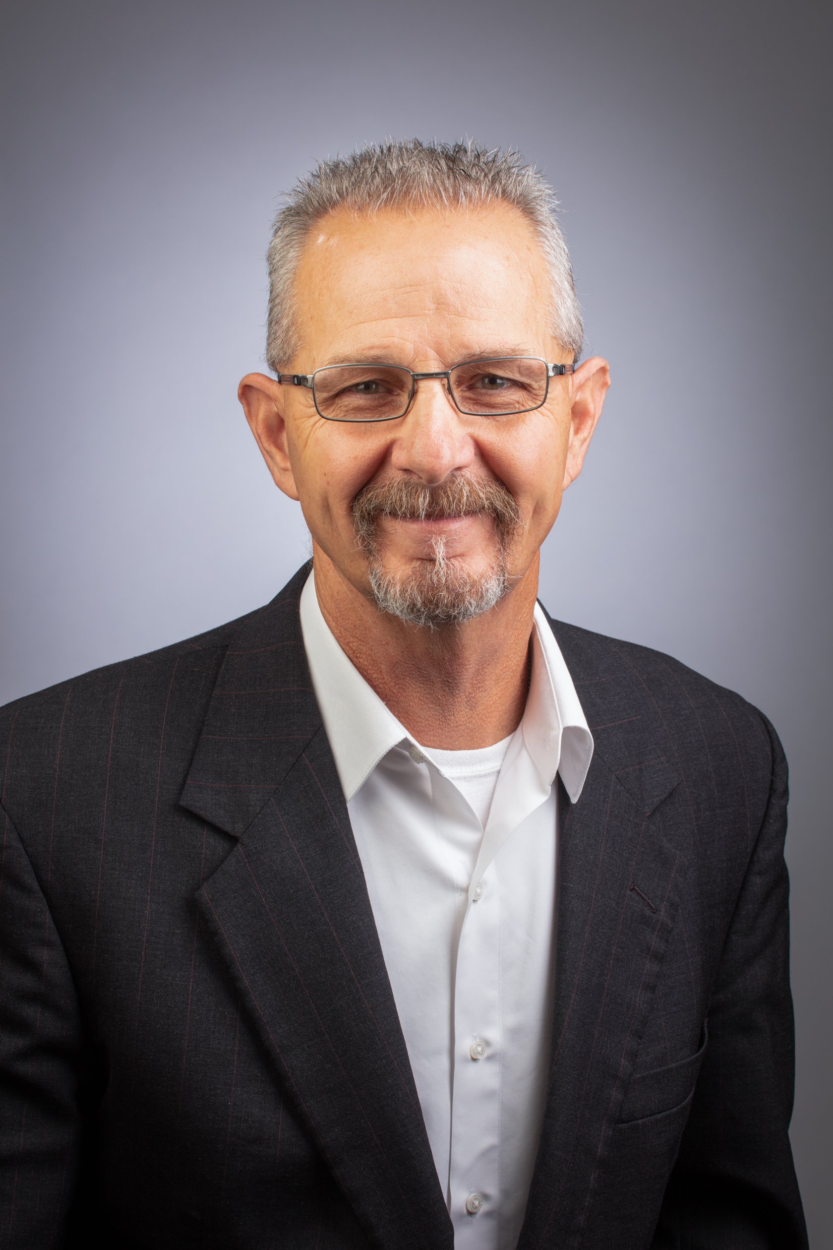 Business headshot portrait for marketing in Laramie, Wyoming.