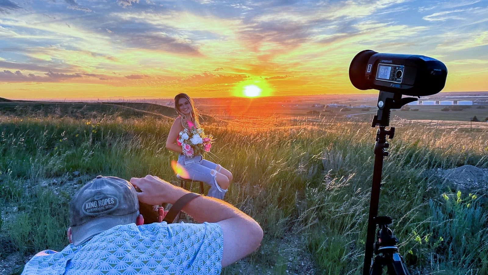 Photo shoot setup during sunset for senior portraits on location near Cheyenne, Wyoming.