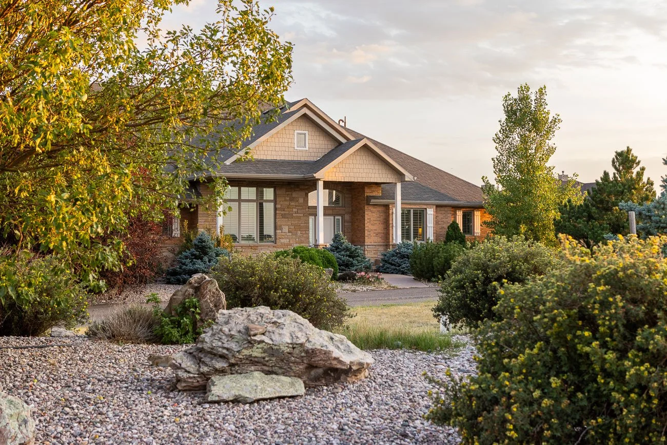 Exterior of a house for sale in Cheyenne, Wyoming. Exterior used to market the house going on the housing market.