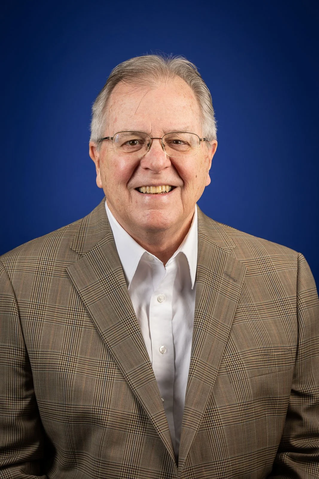Headshot Portrait Photographer in Cheyenne, Wyoming. Portrait of Dave Walsh at Cowboy State Daily in Cheyenne, Wyoming.