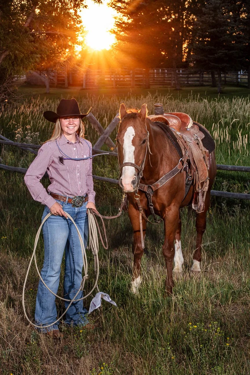 Senior portrait on location with cowgirl and horse.