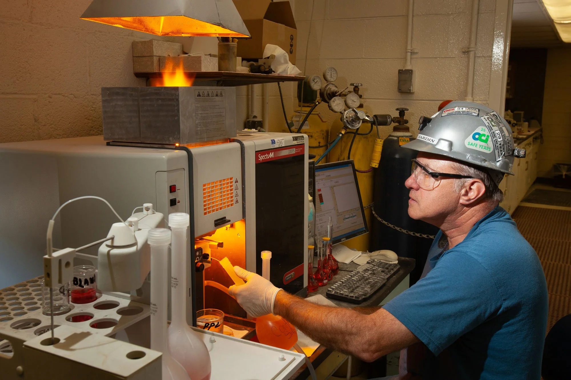 Technician tests for quality control in a lab at a trona mine near Green River, Wyoming.