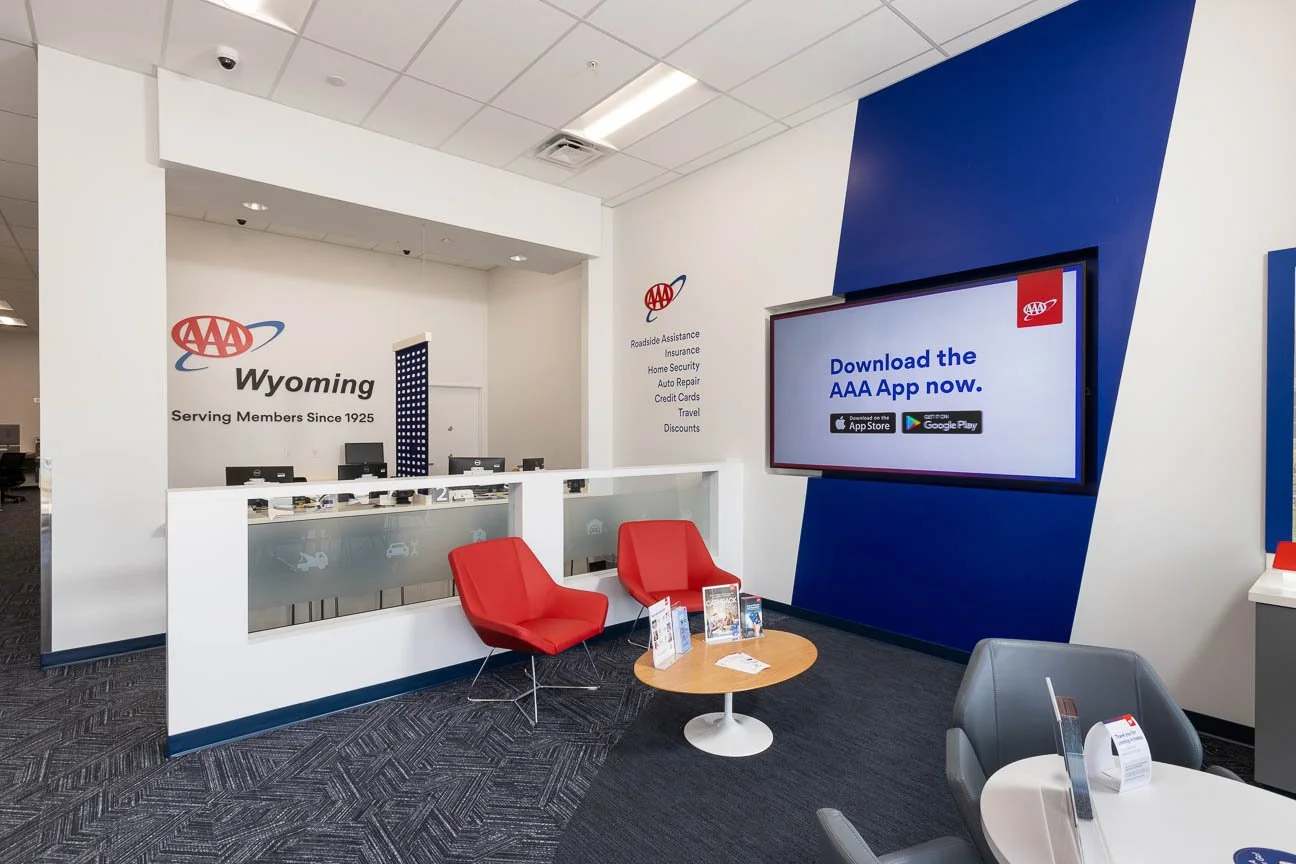 Corporate interior photography, including front desk and waiting area.