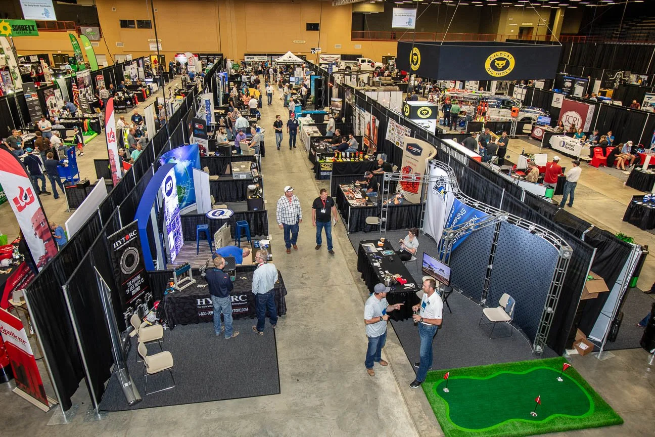 Corporate event photography, including trade shows and conferences.