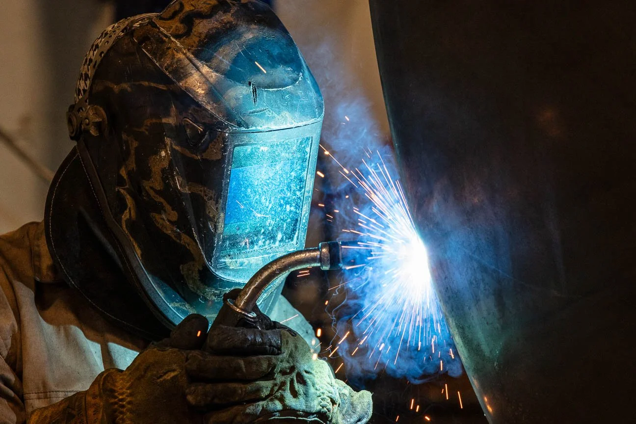 Welder at EMIT Technologies in Sheridan, Wyoming. Editorial photography for Brands On Speed.