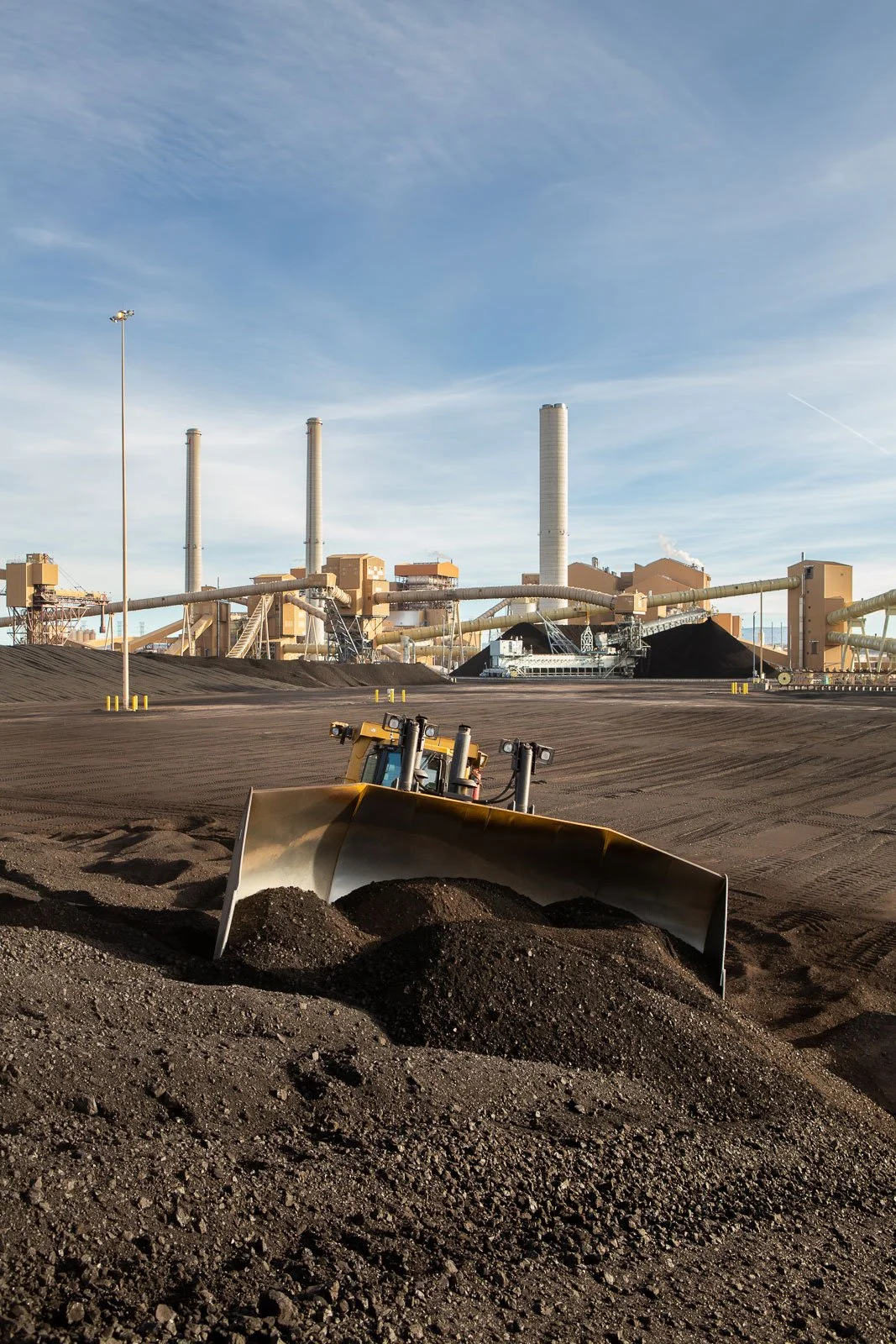 Bulldozer pushing coal at the Springerville Generating Station.
