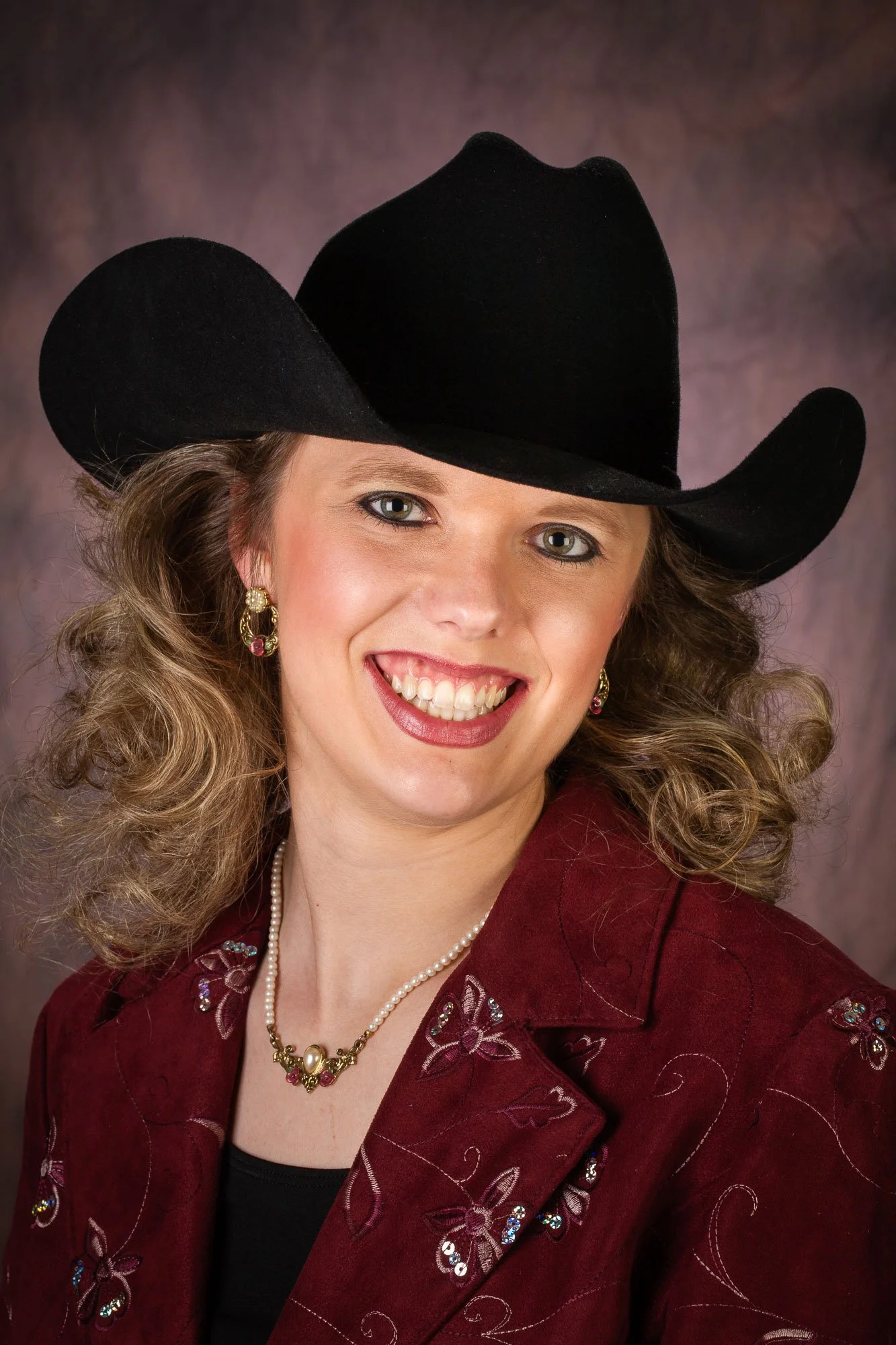 Red-brown or rose colored cloth backgrounds for personal, business, and corporate headshot portraits.