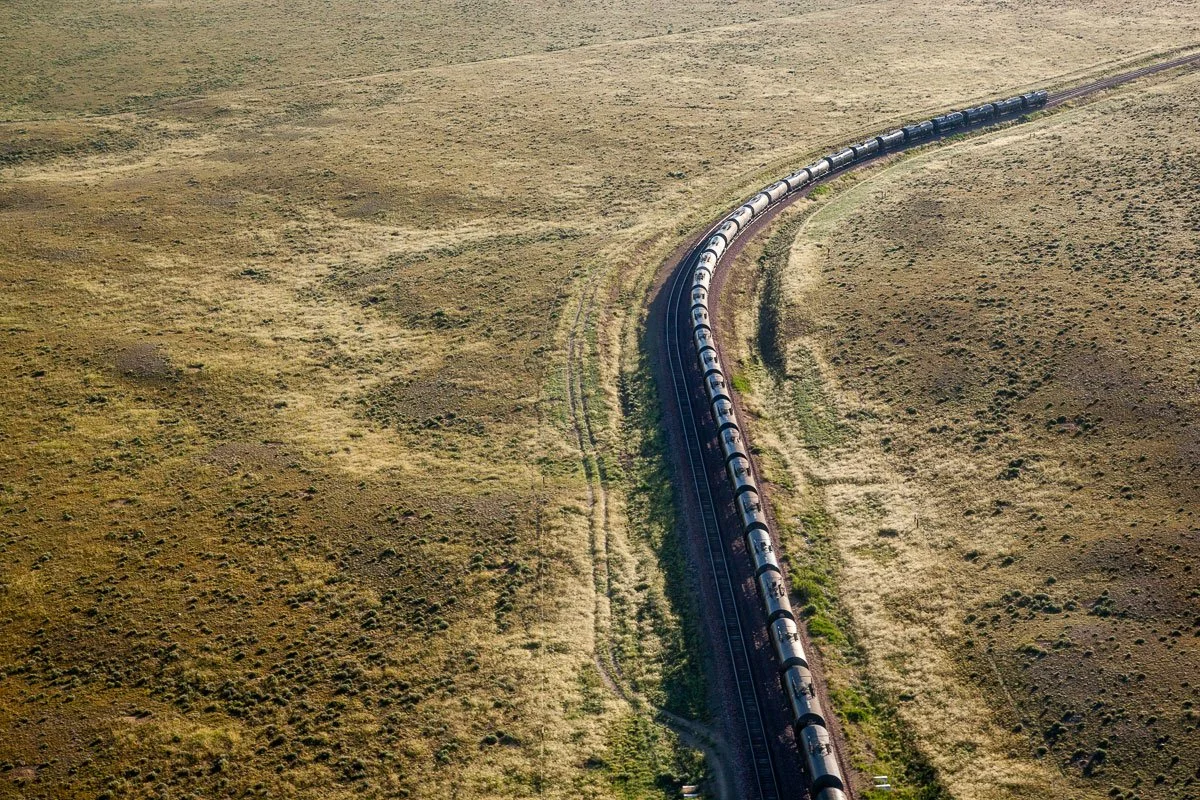 Aerial view of a train with oil tankers in central Wyoming.