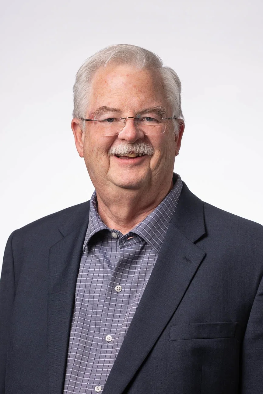 Corporate headshot portrait for marketing and branding.