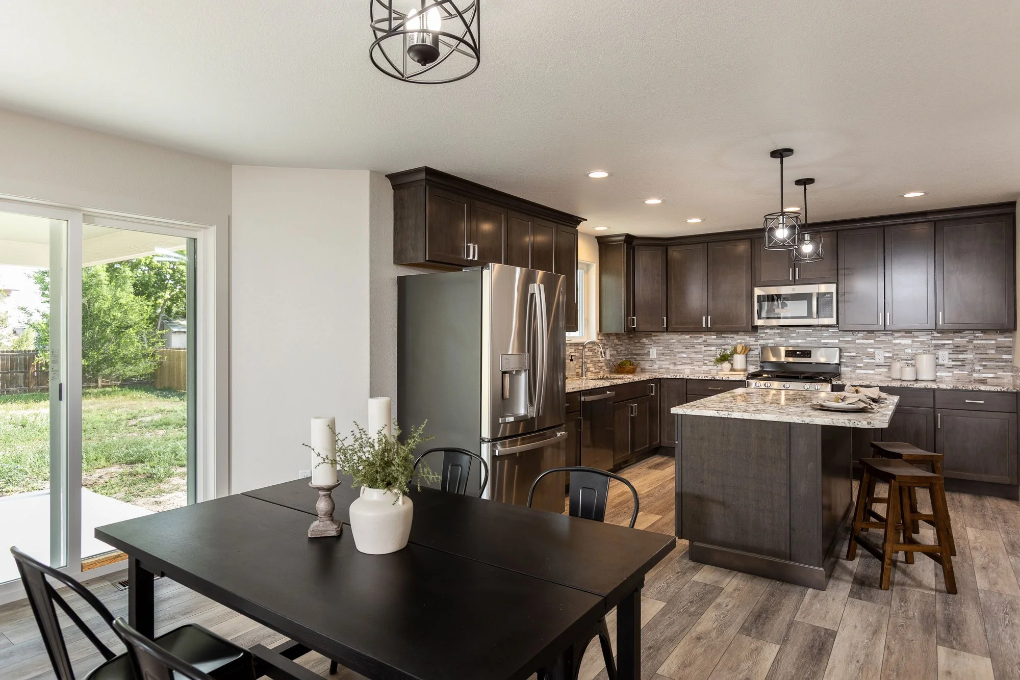 Interior of a dining room and kitchen for a real estate listing in Cheyenne, Wyoming.
