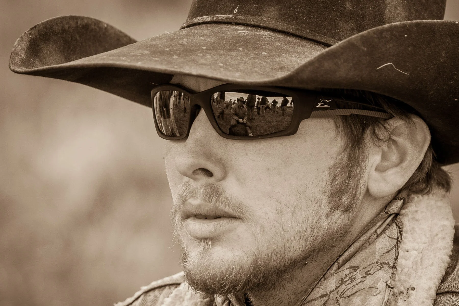 Sepia-toned cowboy portrait at a ranch in Pine Bluffs, Wyoming.