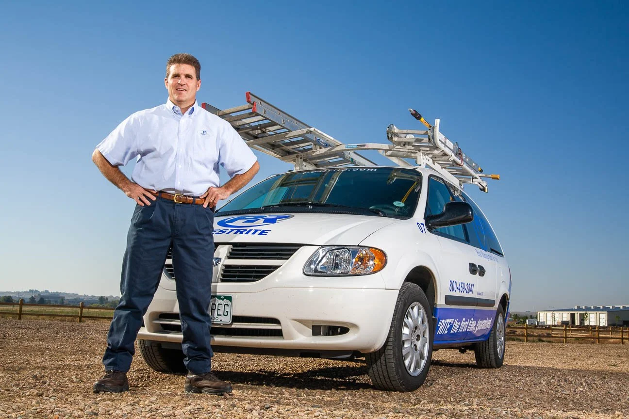 Corporate portrait photography, including the business owner and service vehicle.