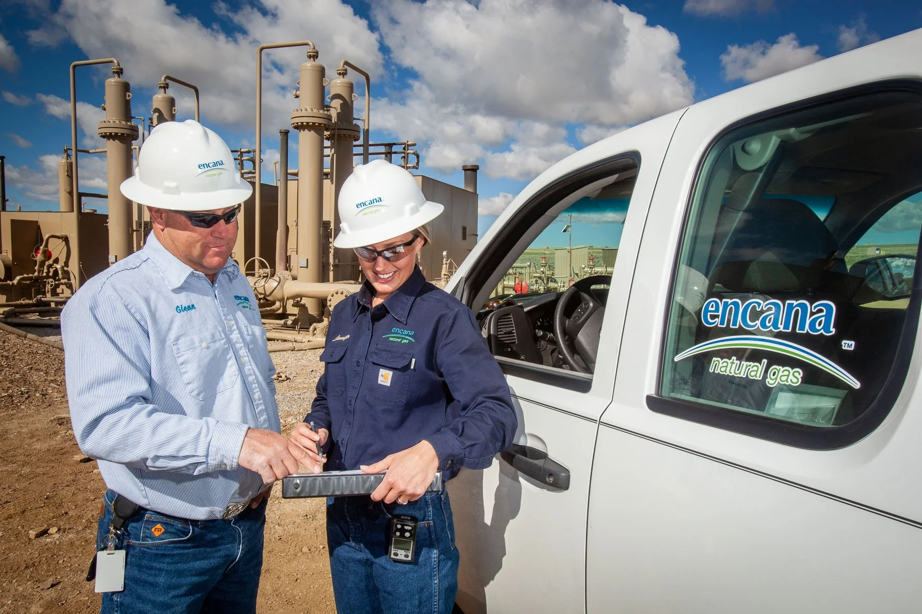 Gas industry workers checking on wells at an oil and gas field in Central Wyoming.