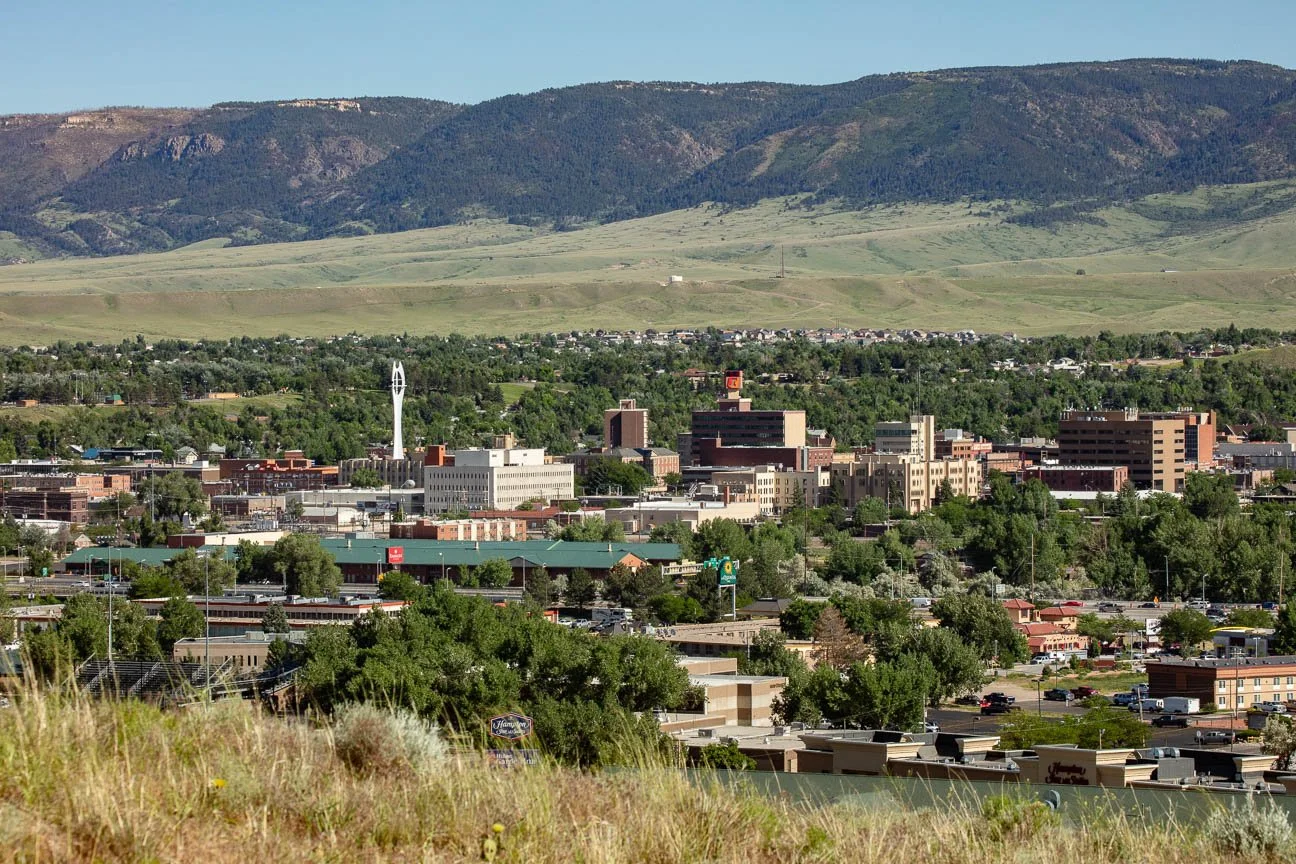 Casper Photographer. Cityscape of Casper, Wyoming, including downtown and mountains.