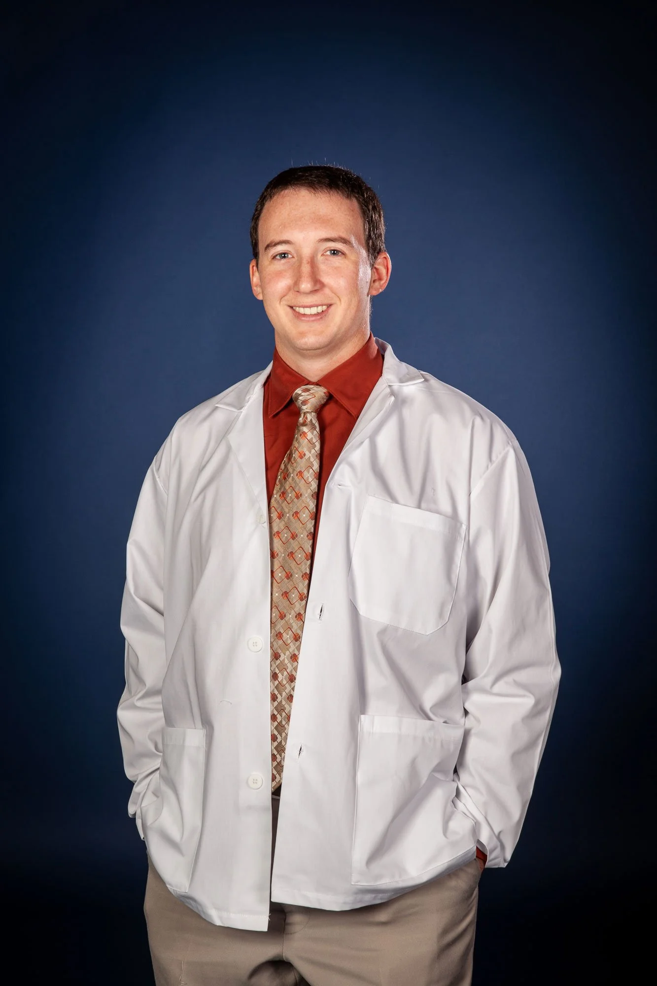 Dark blue portrait background for headshot portraits.