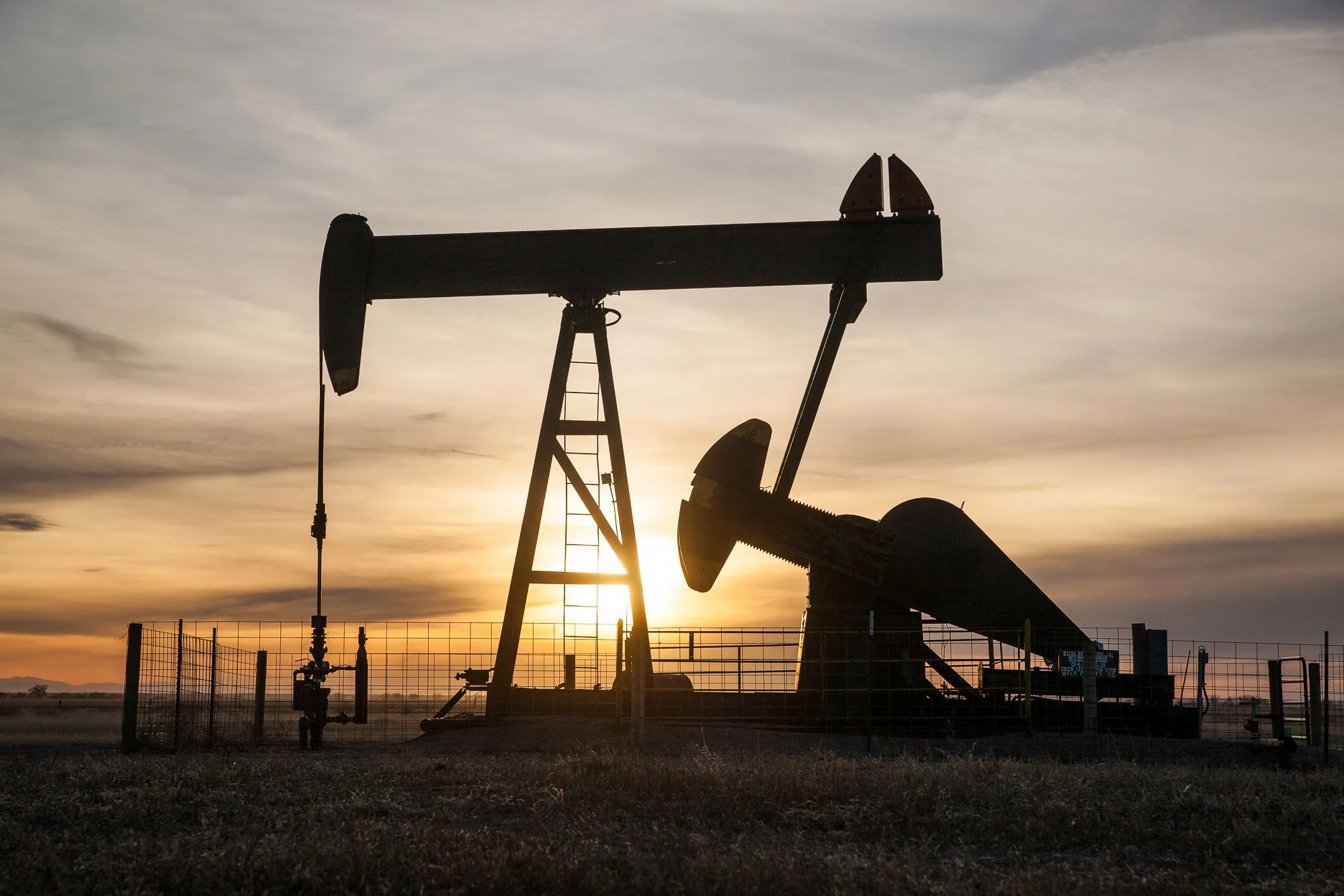 Pumpjack at sunset in Northern Colorado.