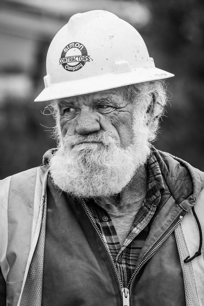 Industrial portrait including a construction worker.