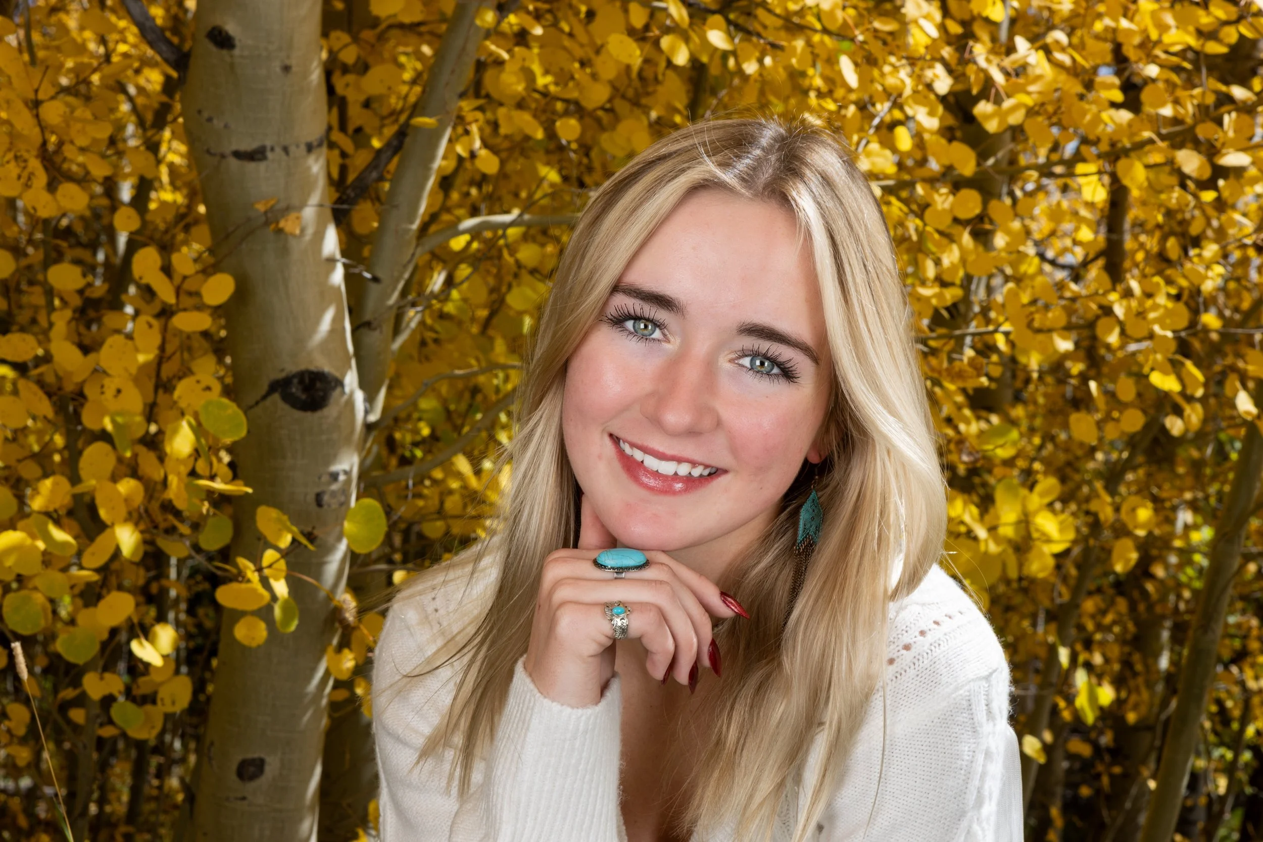 Senior portraits on location in the Big Horn Mountains near Sheridan, Wyoming, with fall colors.