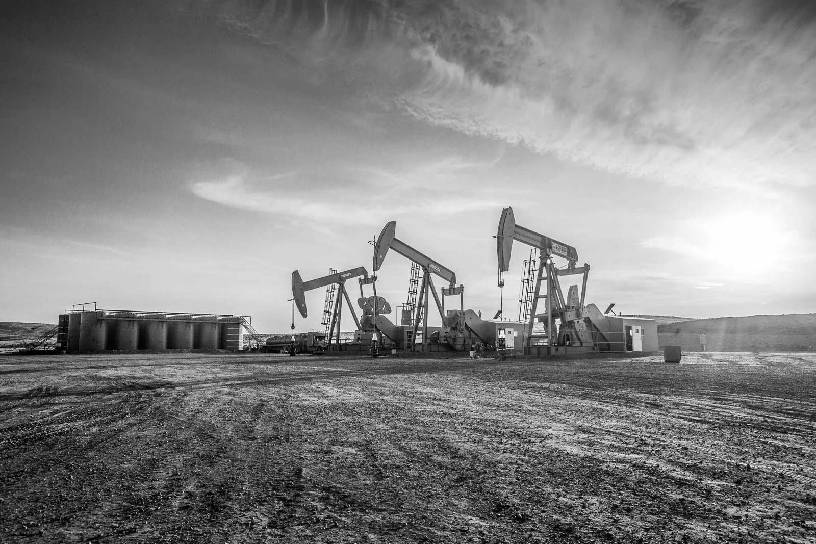 Three pump jacks producing oil in Central Wyoming.