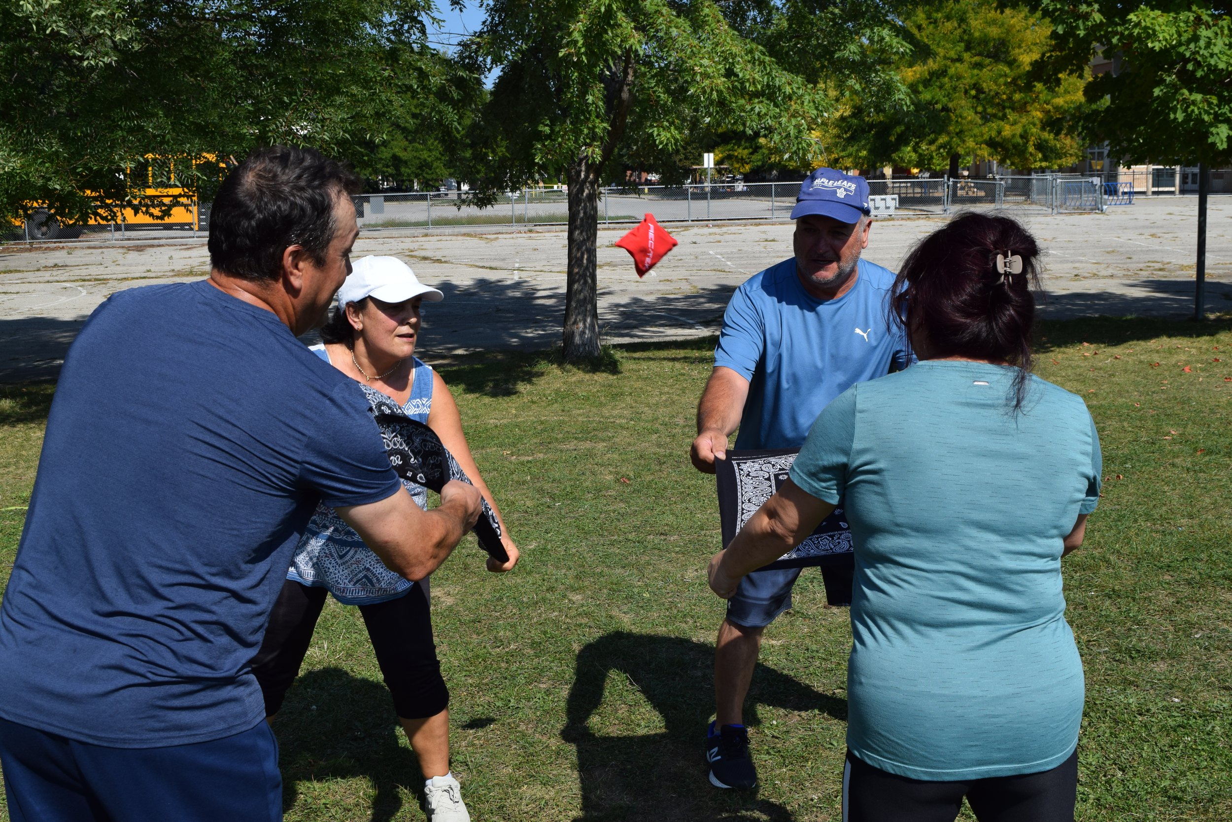 Seniors participating in a fun fitness class that involves playing and building relationships