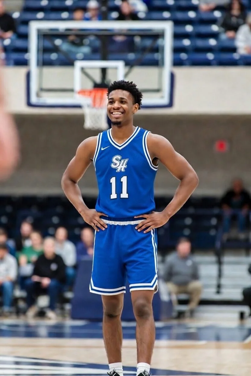 Basketball player smiling on the court showing confidence and enjoyment from staying healthy and injury free