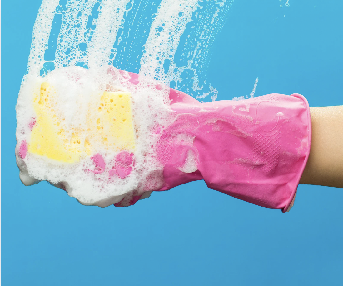 Cleaning glove with soap and sponge