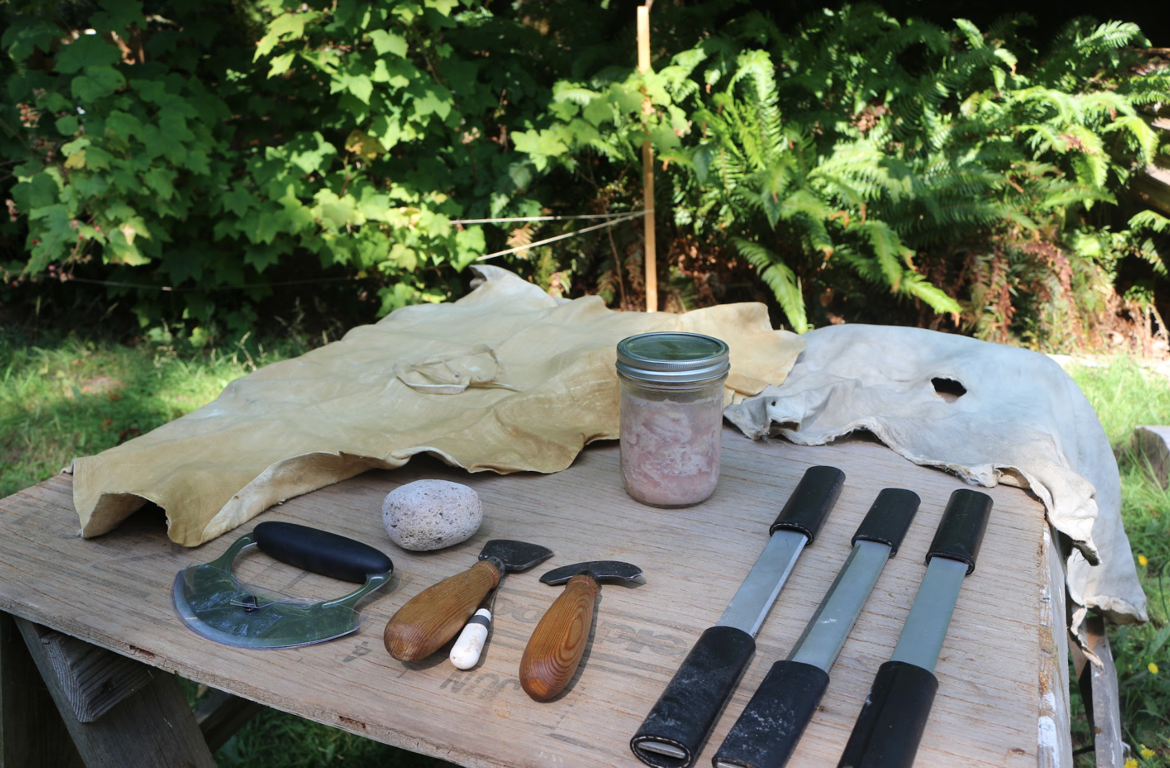 Tool table for hide tanning tools