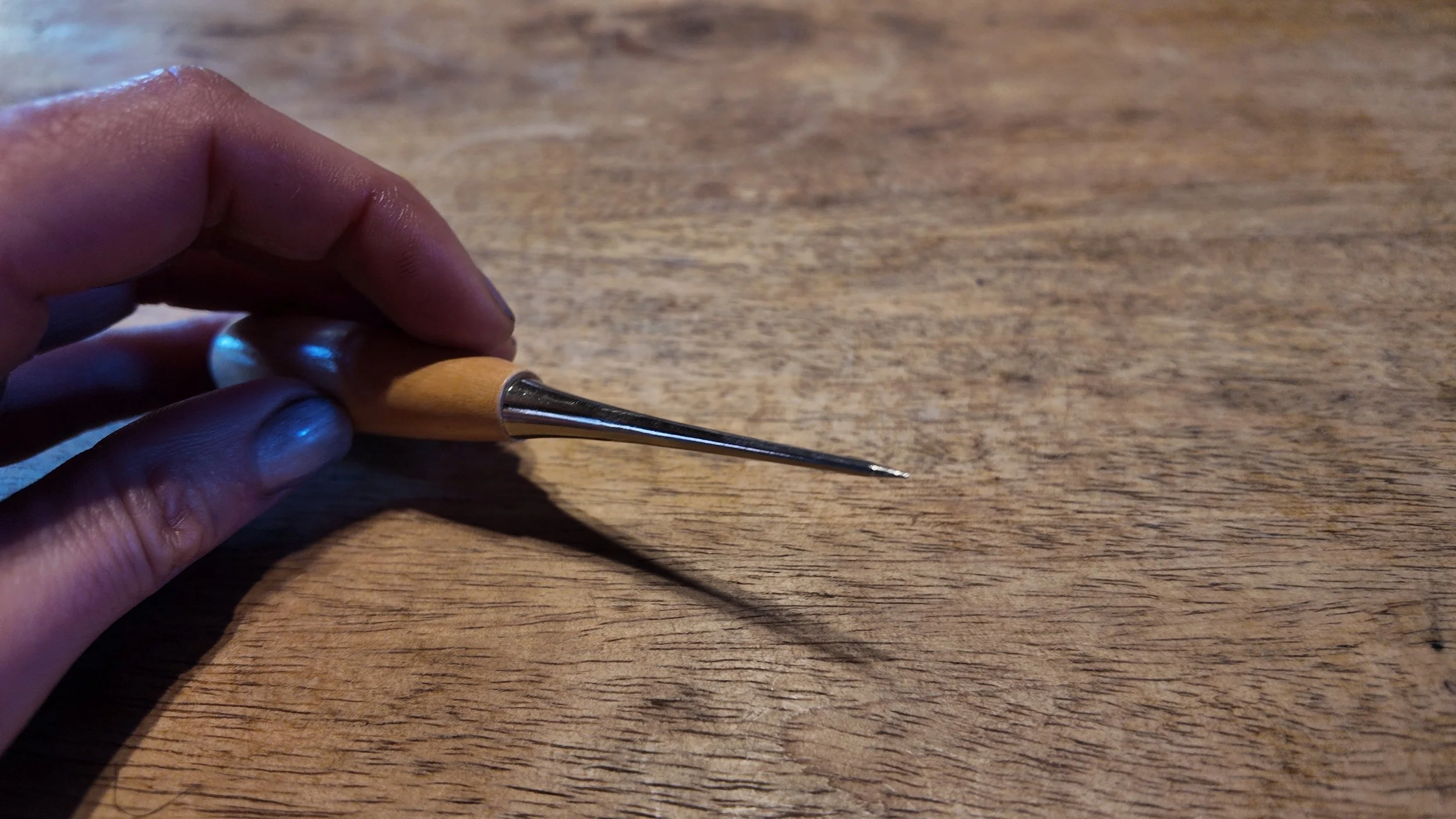 Awl – Framing & Sewing Tool for Hide Tanning - Close Up Hand.JPG